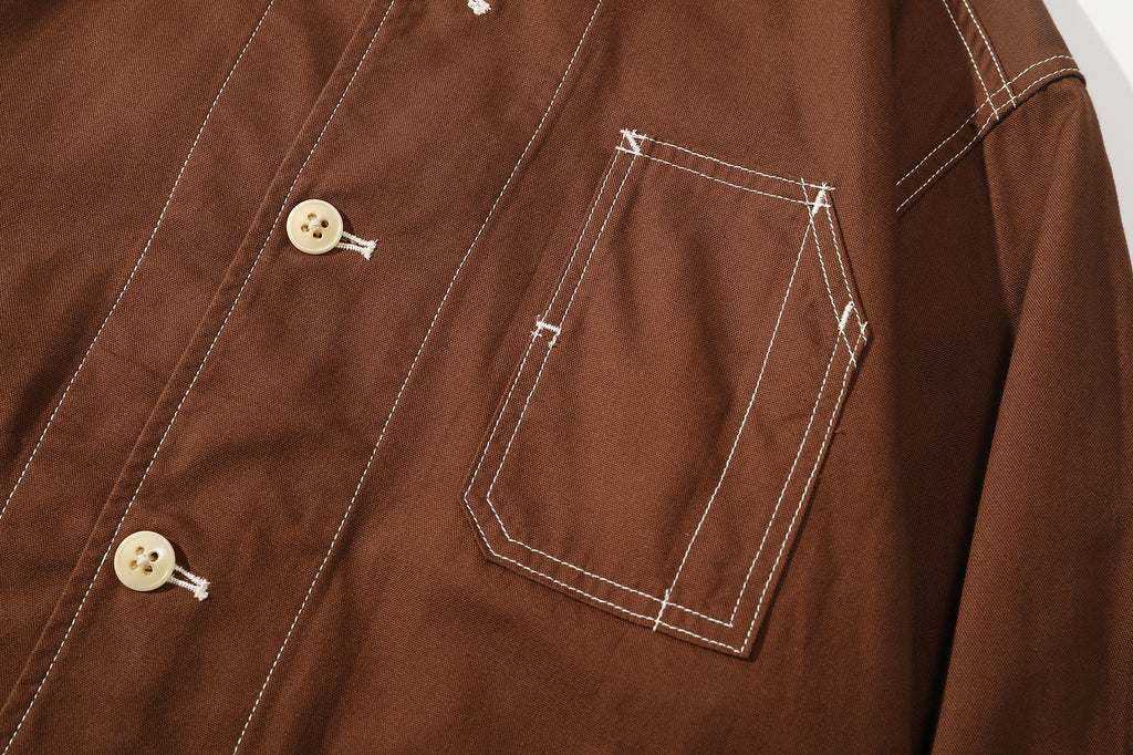 close up of the vintage style watch pocket compartment on chest with contrast stitching