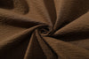 detailed close up texture of ih brown premium cotton seersucker fabric