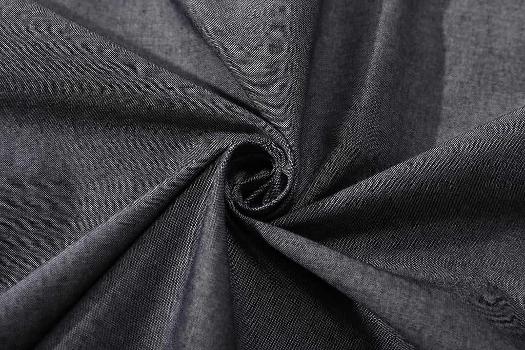 detailed close up texture of ih chambray blue chore shirt fabric