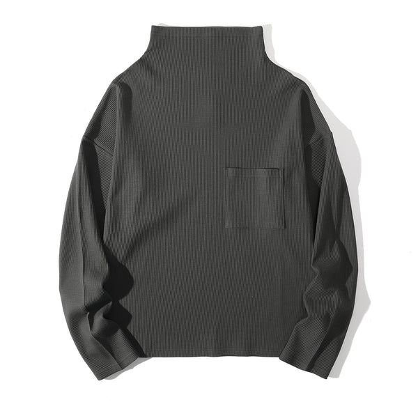 Front view of a Hong Kong made ih cotton waffle turtle neck jumper in charcoal front view