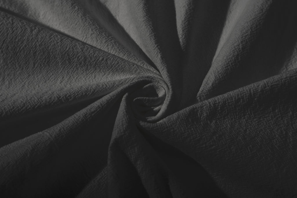 close up of ih charcoal shirt texturized japanese cotton fabric