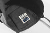 close up of front multi slot tool compartments on charcoal waterproof nylon tote