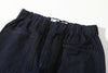 close up of adjustable metal buckle detail on waist of incense harbour denim shorts