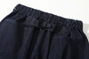 close up of rear patch pockets detail on incense harbour denim buckle shorts