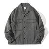Front view of a Hong Kong made ih travel jacket in grey herringbone recycled wool tweed front view