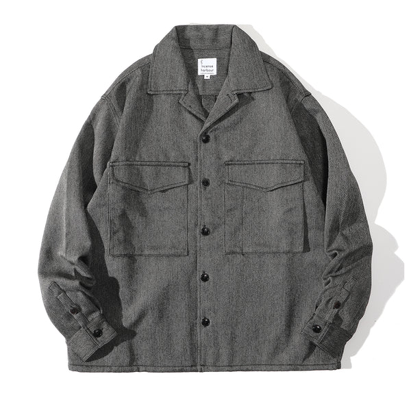 Front view of a Hong Kong made ih travel jacket in grey herringbone recycled wool tweed front view