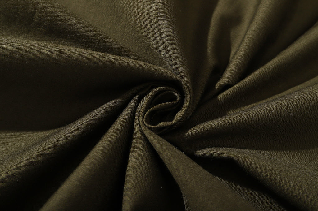 detailed close up texture of ih premium hunter green japanese cotton sateen fabric