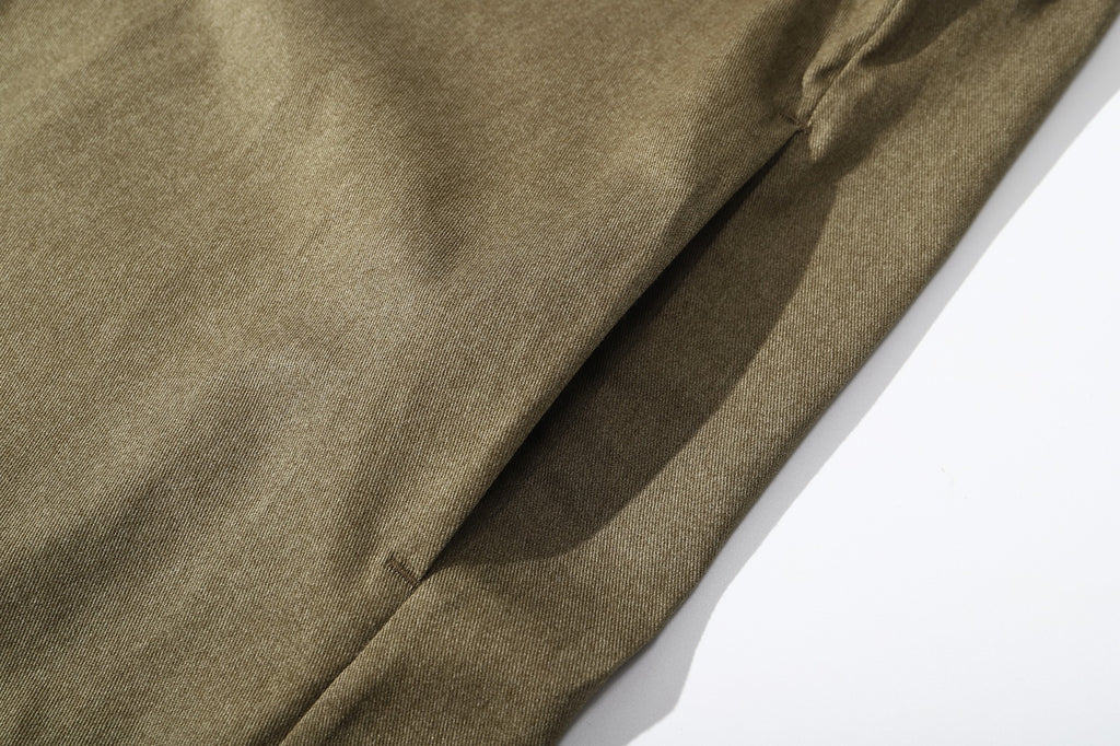 the convenient hidden side pockets of ih hunter green cotton shirt dress 