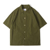 Front view of a Hong Kong made ih relaxed fit and boxy cut seersucker summer shirt in hunter green