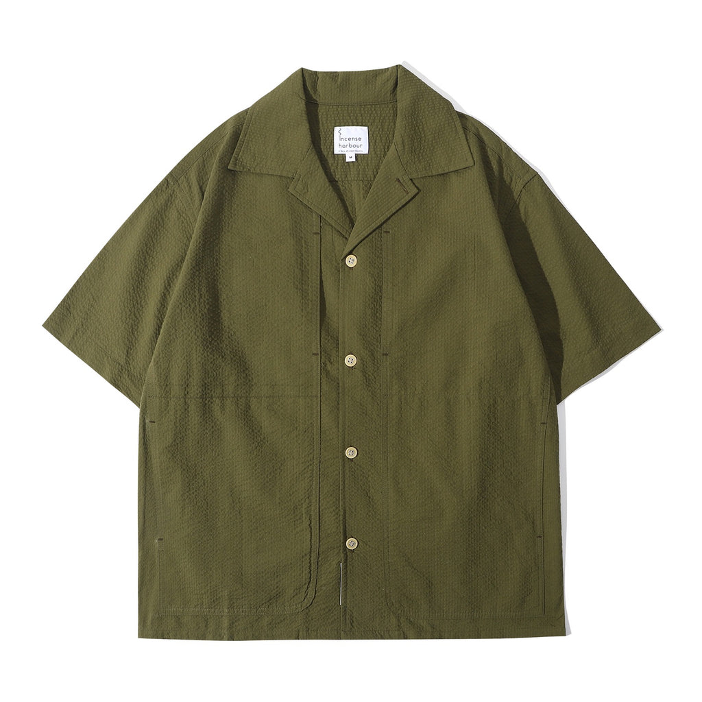 Front view of a Hong Kong made ih seersucker summer shirt in hunter green