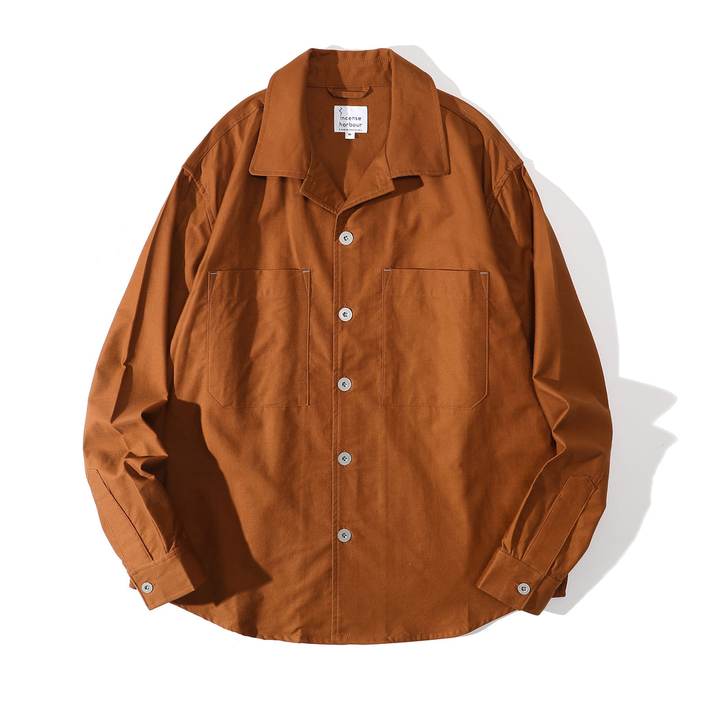 Front view of a Hong Kong made mud yellow cotton sateen shirt front view