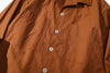 close up of front closure featuring premium metal buttons from Japan YKK