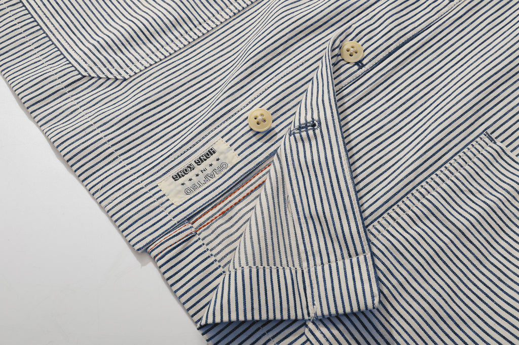 close up of front hem construction on relaxed fit jacket