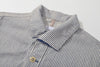 close up of front closure and premium corozo buttons on stripe casual jacket