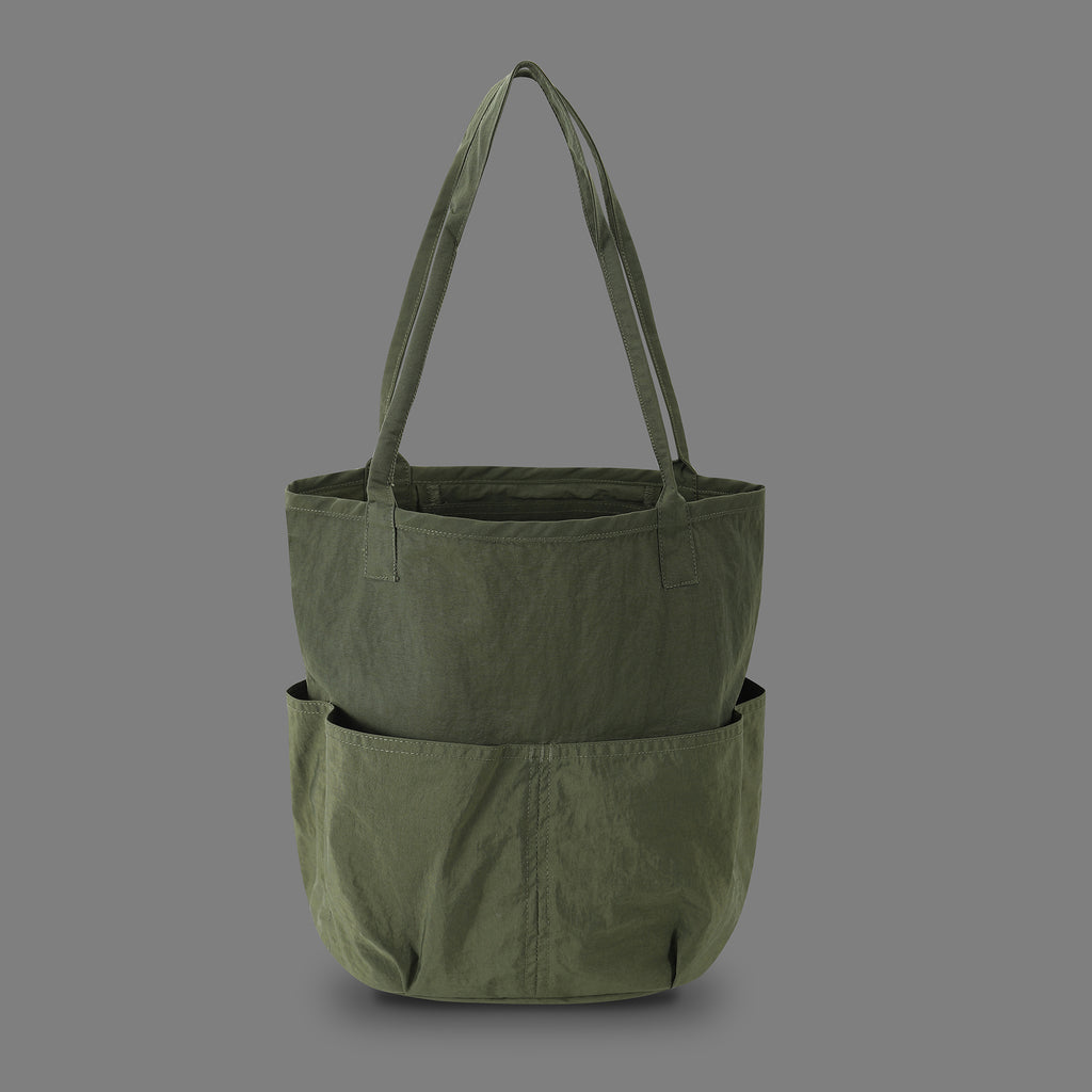 Front view of a Hong Kong made ih high capacity cylindrical waterproofed tool tote bag in olive green