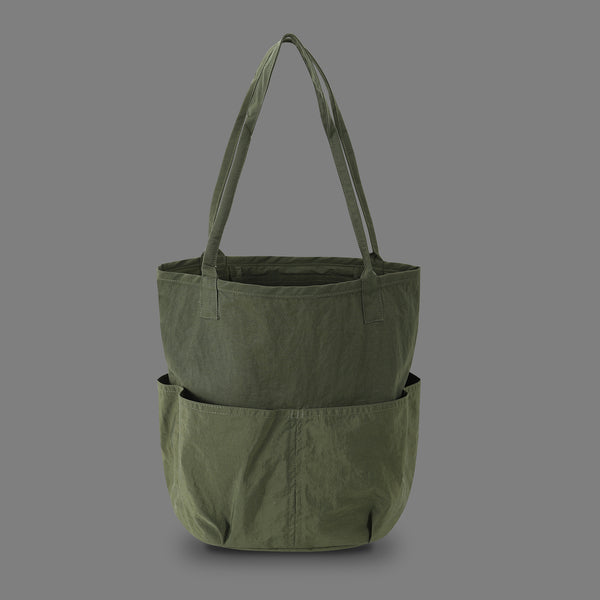 Front view of a Hong Kong made ih high capacity cylindrical waterproofed tool tote bag in olive green