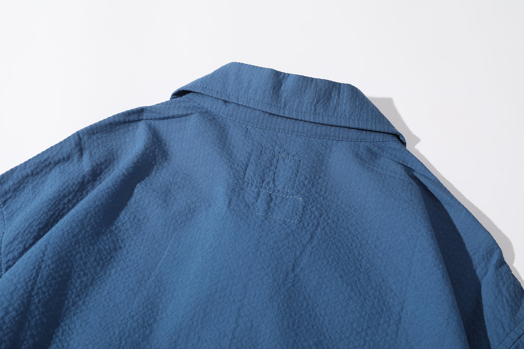 ih steel blue seersucker polo shirt close up of the back collar