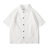 Front view of a Hong Kong made ih relaxed fit and boxy cut textured summer shirt in white