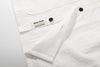ih textured white cotton shirt bottom hem and brand woven label