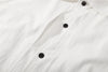 ih textured white cotton shirt detailed close up view of the hidden pockets