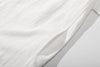 ih textured white cotton shirt detailed close up view of the side pockets design