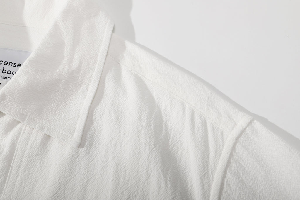 ih textured white cotton shirt of the clean shoulder seam construction