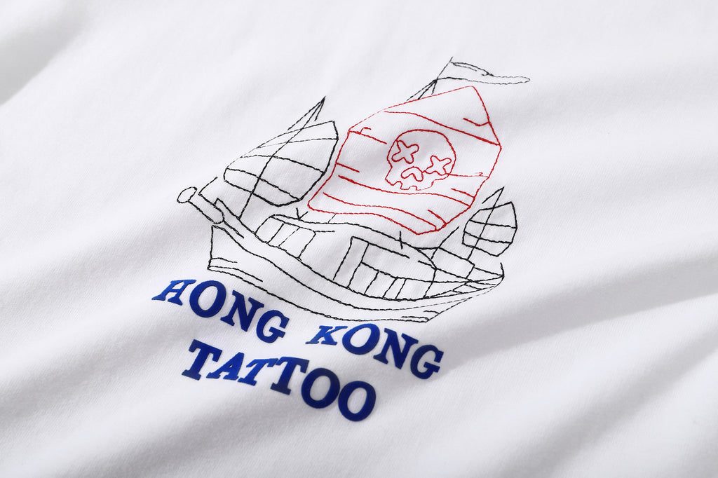 close up of the tattoo inspired Chinese junk pirate ship embroidery and heat transferred wording