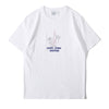 Front view of a Hong Kong made ih regular fit suede finished cotton tattoo inspired ufo t shirt in white