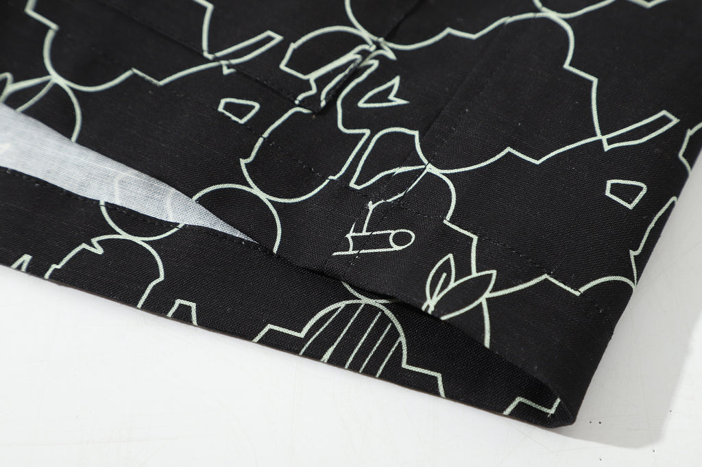 hem view of a Hong Kong made GOC Studio black lucky bamboo Tencel linen shirt