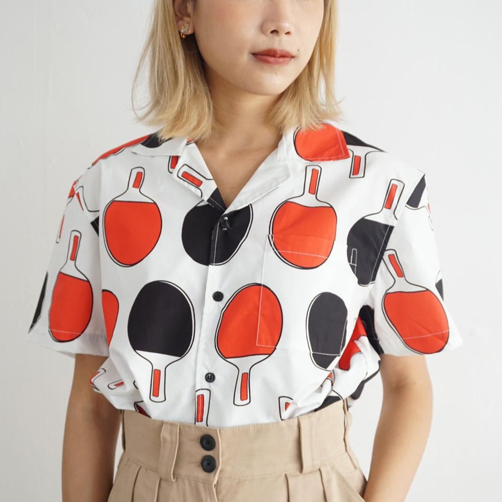 female model mid-shot of a Hong Kong made GOC Studio black and red ping pong cotton poplin shirt
