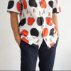 male model close up shot of a Hong Kong made GOC Studio black and red ping pong cotton poplin shirt