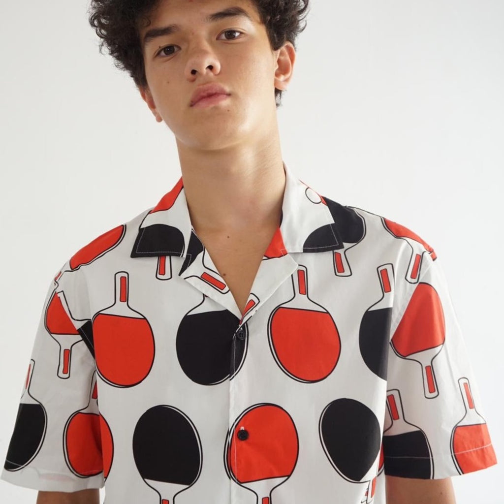 male model mid-shot of a Hong Kong made GOC Studio black and red ping pong cotton poplin shirt