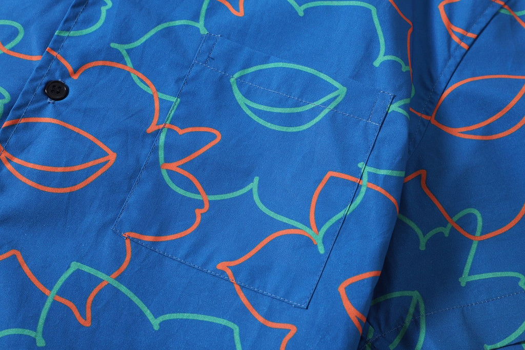 close up of matching patterned chest pocket on a Hong Kong made GOC Studio blue daffodil cotton poplin shirt