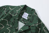 collar view of a Hong Kong made GOC Studio green daffodil Tencel linen shirt