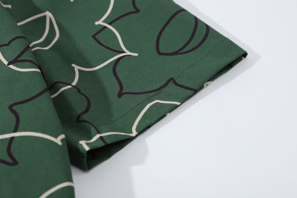 close up of sleeve hem and stitching detail  on a Hong Kong made GOC Studio green daffodil Tencel linen shirt