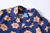 collar view of a Hong Kong made GOC Studio navy and orange daffodil cotton poplin shirt