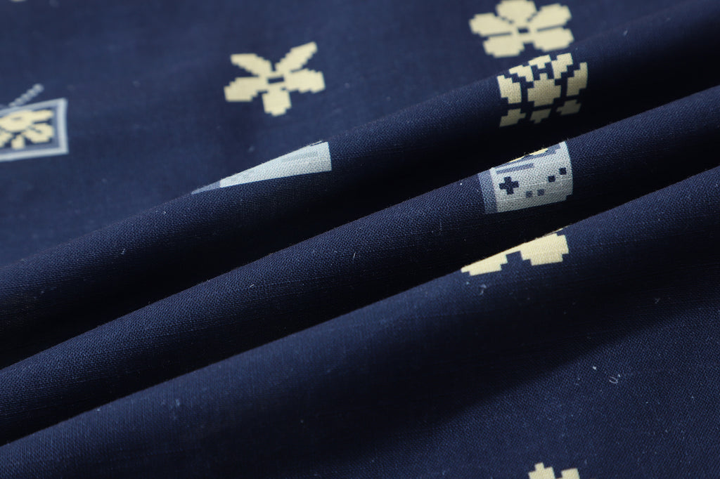 close up of navy retro pixelated floral Tencel linen fabric texture