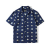 front view of a Hong Kong made GOC Studio navy retro pixelated floral Tencel linen shirt