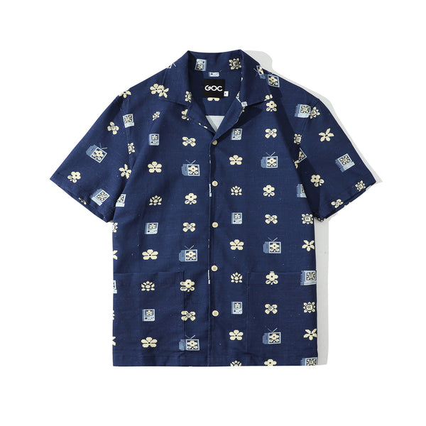front view of a Hong Kong made GOC Studio navy retro pixelated floral Tencel linen shirt