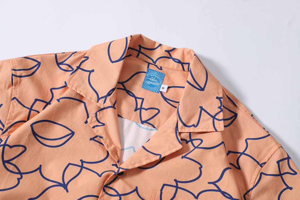 collar view of a Hong Kong made GOC Studio orange daffodil cotton poplin shirt