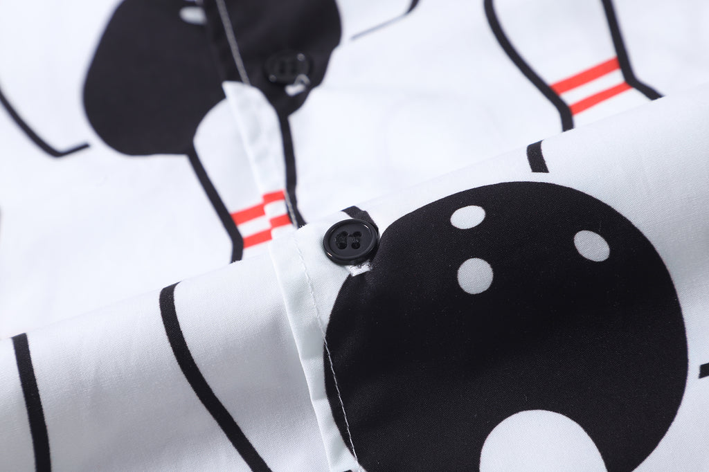 close up of corozo button closure on a Hong Kong made GOC Studio white and black bowling cotton poplin shirt