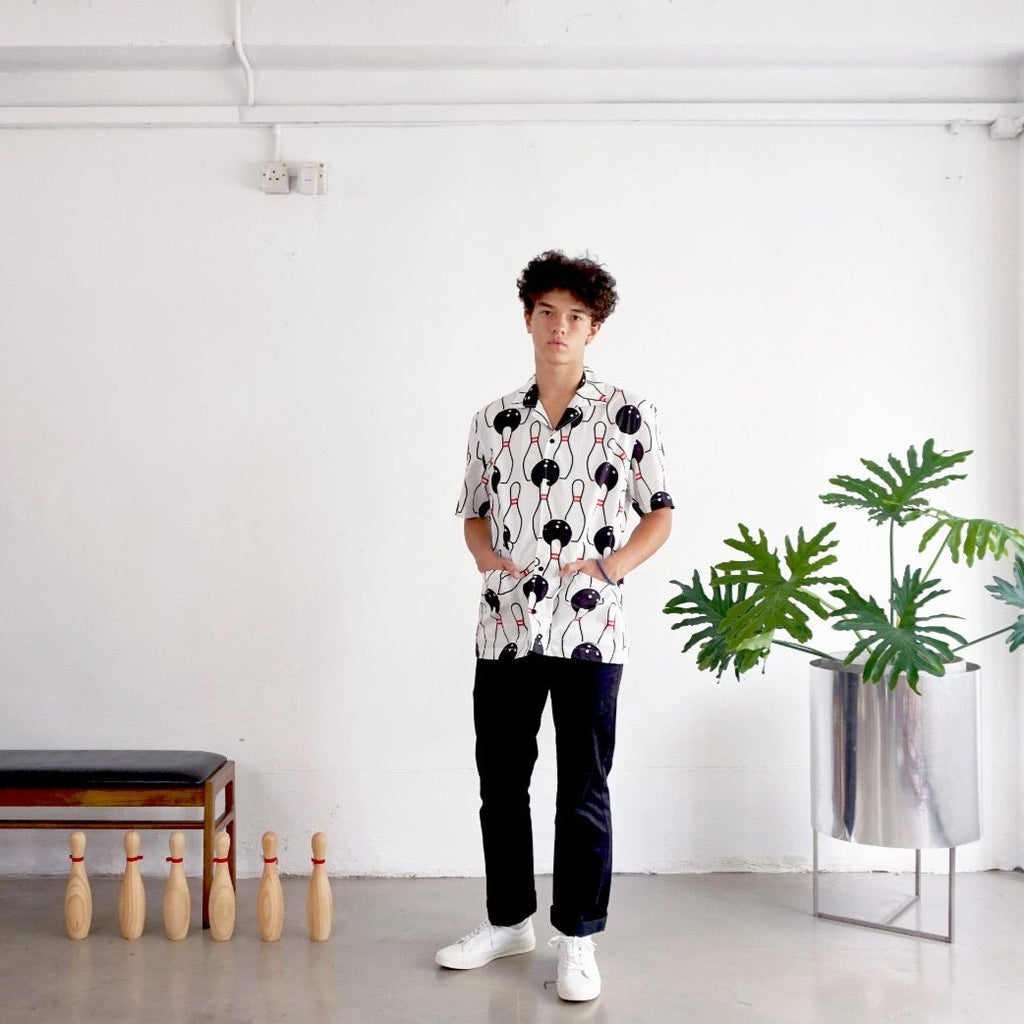 model full shot of a Hong Kong made GOC Studio white and black bowling cotton poplin shirt