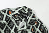 collar view of a Hong Kong made GOC Studio white and black circle windows Tencel linen shirt