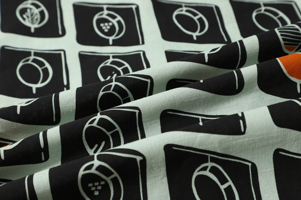 close up of white and black circle windows Tencel linen fabric texture