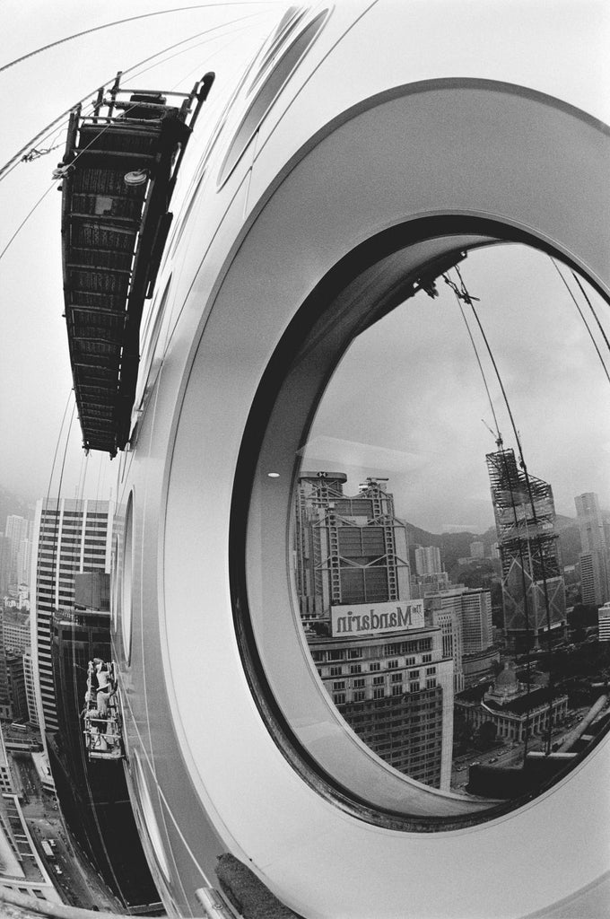 reference image close up shot of the iconic 1970s Jardine House architecture in Hong Kong