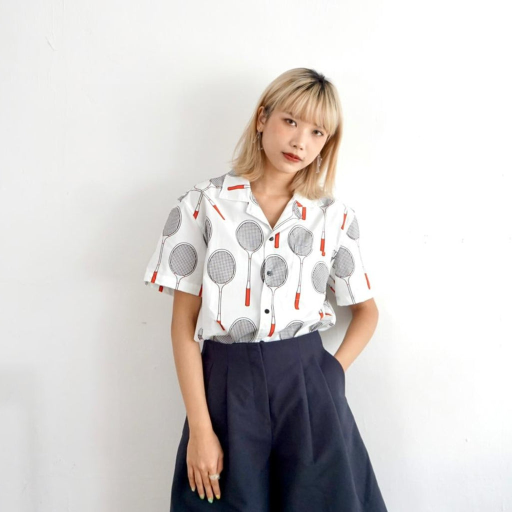 female model mid-shot of a Hong Kong made GOC Studio white and red badminton cotton poplin shirt
