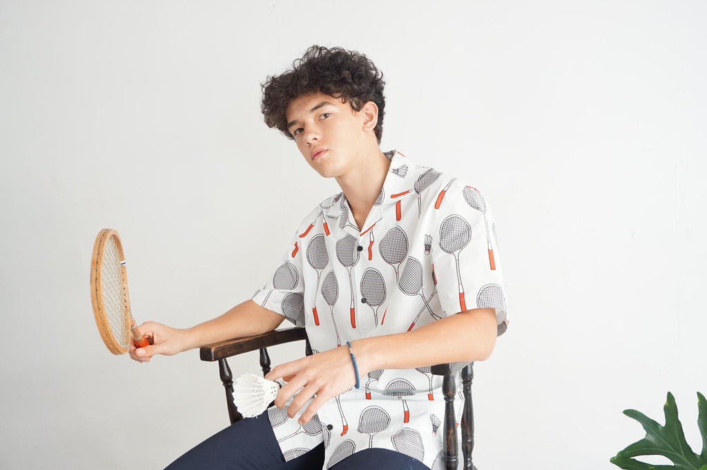 male model mid-shot of a Hong Kong made GOC Studio white and red badminton cotton poplin shirt