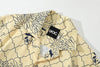 collar view of a Hong Kong made GOC Studio yellow chrysanthemum Tencel linen shirt