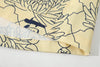 hem view of a Hong Kong made GOC Studio yellow chrysanthemum Tencel linen shirt