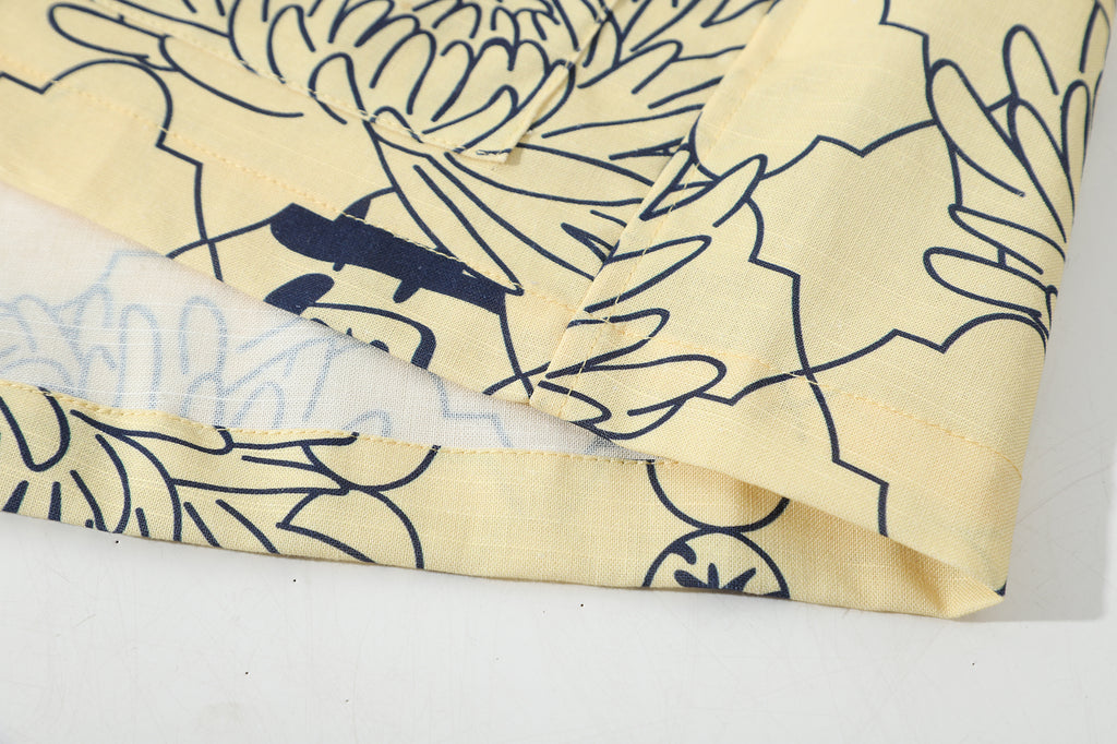hem view of a Hong Kong made GOC Studio yellow chrysanthemum Tencel linen shirt